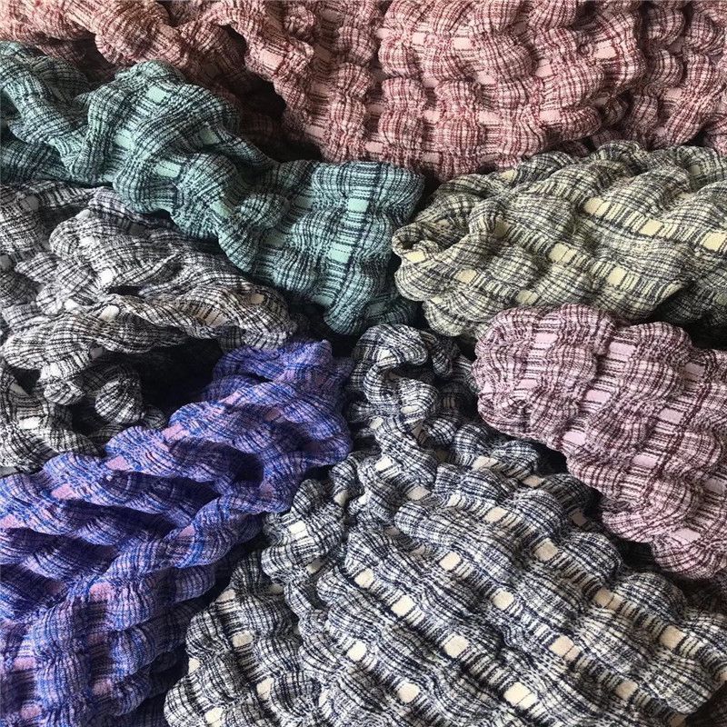 现货供应混纱双色泡芙格凹凸立体泡泡皱布服装鞋材针织面料