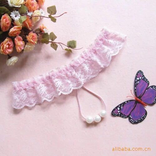 Ropa interior sexy de las mujeres europeas y americanas perla transparente Tanga cintura baja encaje tentación mujer T pantalones ropa interior sexy