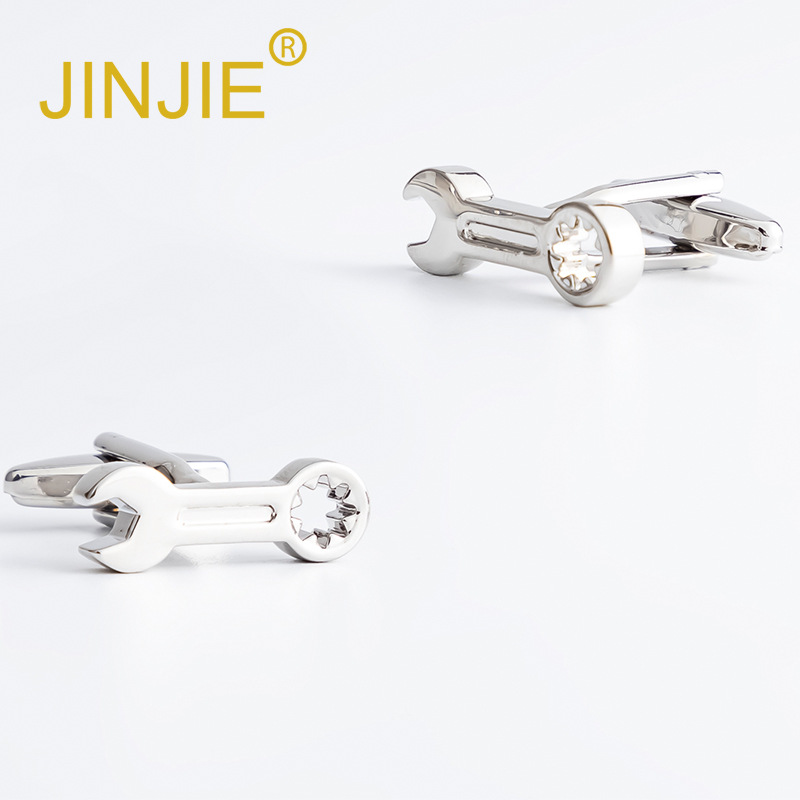 New silver-plated, fun-shaped metal cufflinks with a wrench design, wholesale men's suit cufflinks for export
