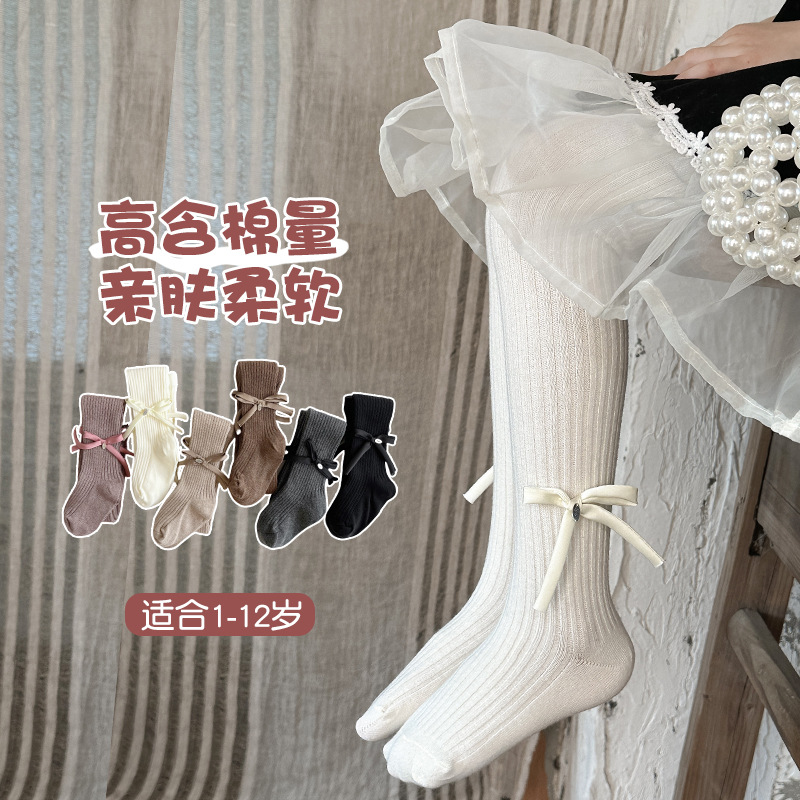 Girls' pantyhose 2024 autumn new solid color versatile children's bow leggings outside and feet bottoming socks
