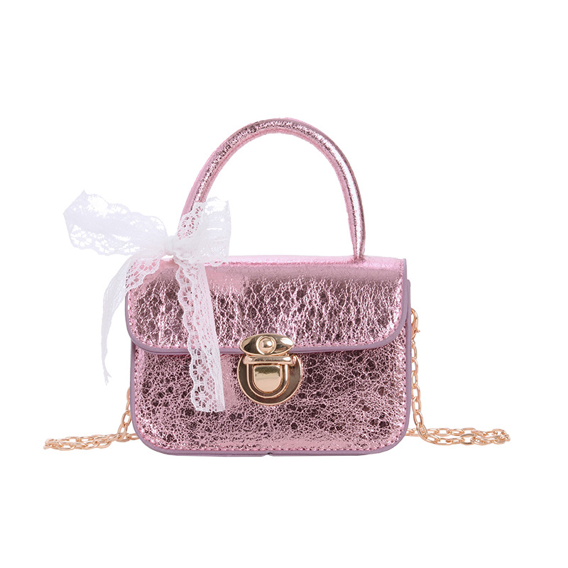 2026 bolso de niña pequeña mini bolso de cadena simple de color sólido bolso coreano nuevo bolso de cambio para niños
