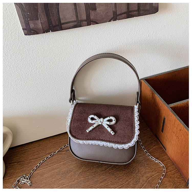 Bolsas de comercio exterior para niños, bolsas de cadena mini compactas, bolsas de arco dulce y lindas, bolsas de mano para padres e hijos.