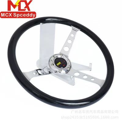with a recessed, electroplated circular — Steering wheel