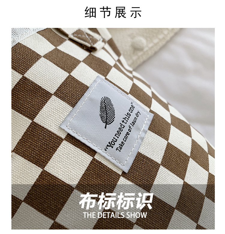 A fashionable new Japanese and Korean chic black and white checkered canvas bag, a large-capacity single-shoulder bag for women, and a simple student handbag undefined