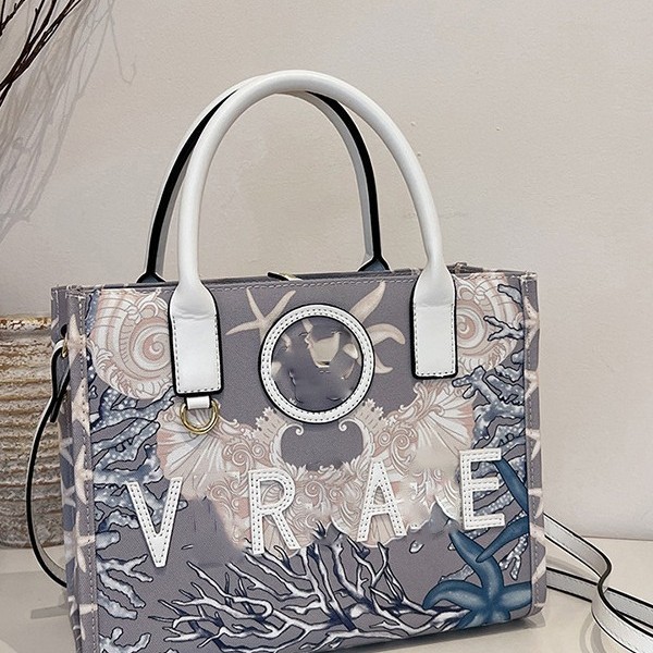 Bolsos bordados de gran capacidad para damas 2025 nuevo estilo de moda de alta calidad bolso de hombro de todo fósforo bolso transfronterizo portátil