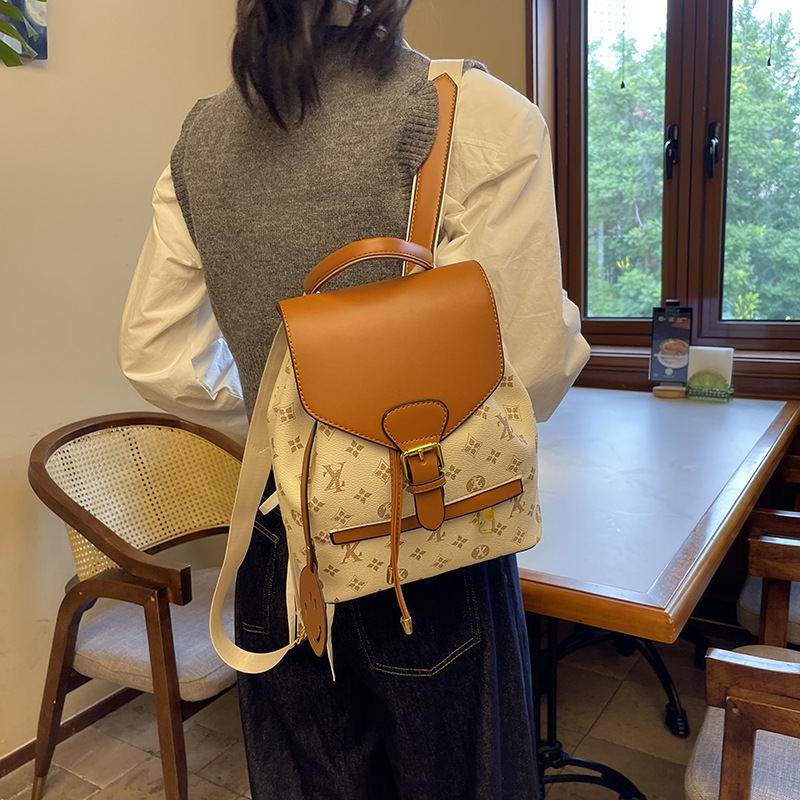 Mochila retro para mujer, mochila de color de contraste de gran capacidad para todo fósforo 2024 nuevo bolso de mujer estampado de alto valor de moda europea y americana