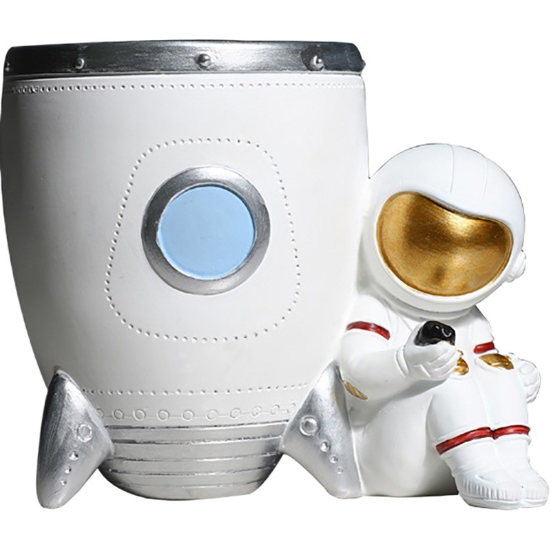 Lindo Día de los niños astronauta titular de la pluma regalo creativo decoración de escritorio cubo de la pluma caja de almacenamiento de artesanía al por mayor