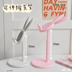 携帯電話のデスクトップスタンドかわいい漫画のウサギのタブレットの通用のスタンドは伸縮を調節することができます。
