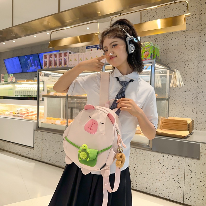 Mochila japonesa encantadora de dibujos animados 2024 nueva extraña mochila de muñeca de gran capacidad de muñeca de estudiantes