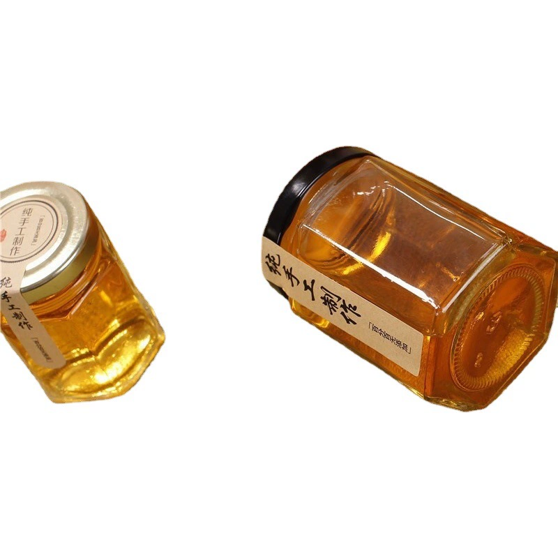 Прямые продажи оптовой гексагональной бутылки меда 280ml380ml прозрачная стеклянная бутылка гексагональной пряный соус бутылка с крышкой соленья бутылки