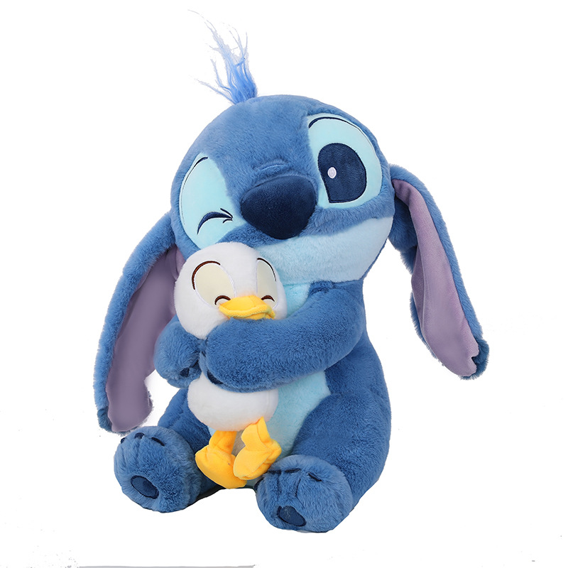 Nuevo estilo transfronterizo que sostiene pato Stitch peluche almohada para niños muñeca de trapo novia regalo de cumpleaños fabricante en stock