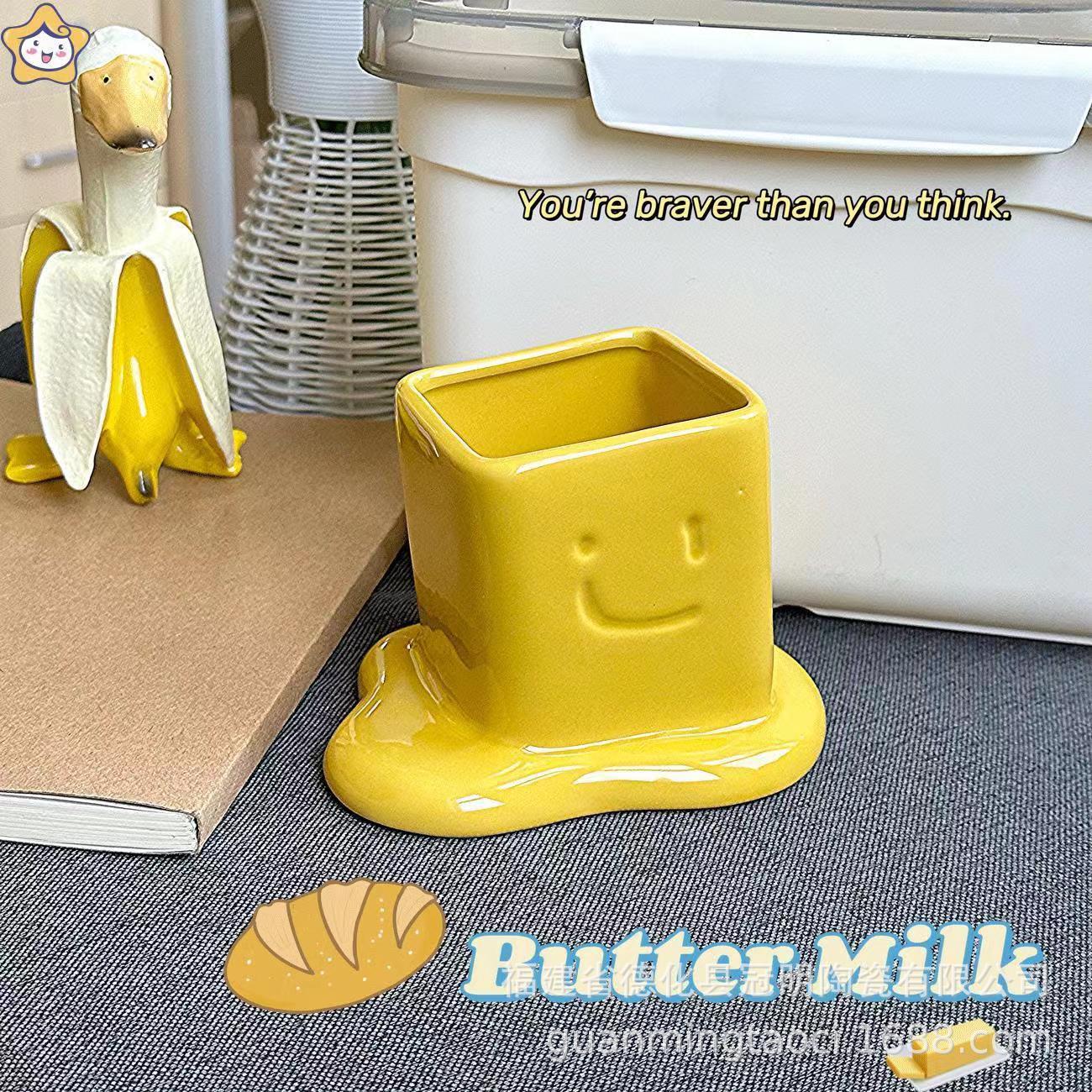 Mantequilla americana titular de la pluma de cerámica pequeña de alta apariencia papelería maquillaje cepillo de almacenamiento ins