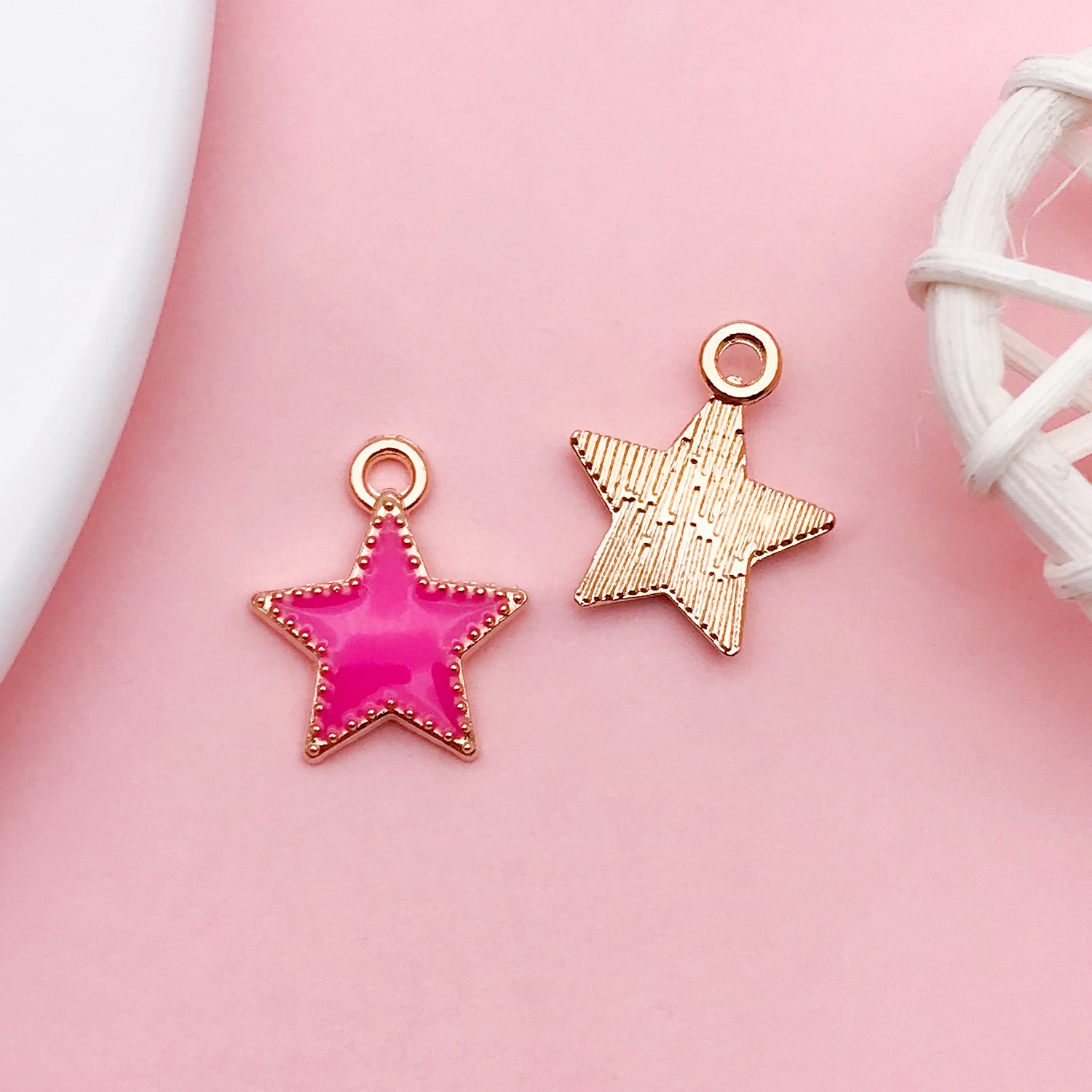 17572-玫红色滴油锌合金星星13x15-0.6g