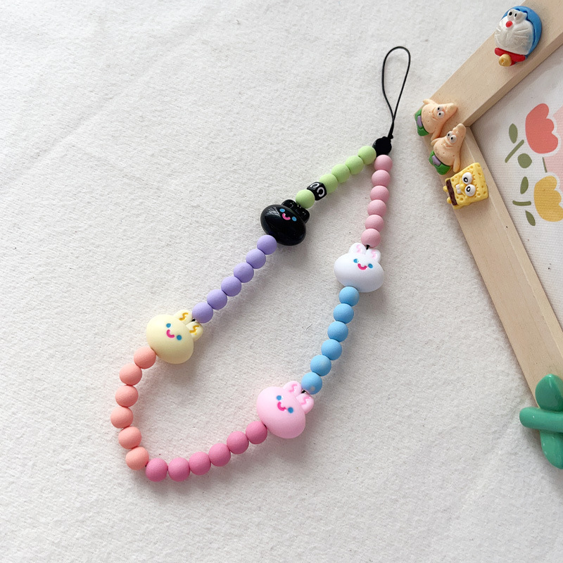 Tian Xiwei con una linda chica crema de dulces conejos acrílico de color multipropósito a prueba de pérdida de la cadena de colgante de teléfono móvil