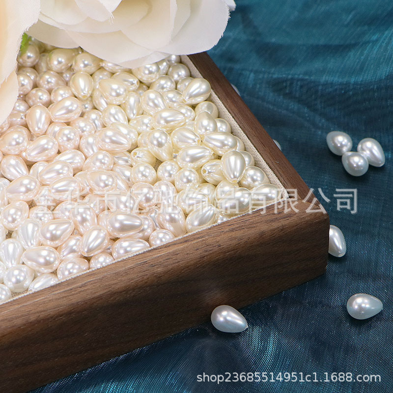 Imitación transfronteriza de perlas de casa imitación de conchas de agujero recto gotas de agua cuentas dispersas DIY accesorios de joyería pendientes colgantes para el cabello al por mayor
