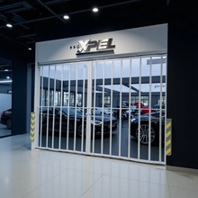 批发零售4S店透视门折叠门商铺不锈钢白钢工字片管连接升降电动门