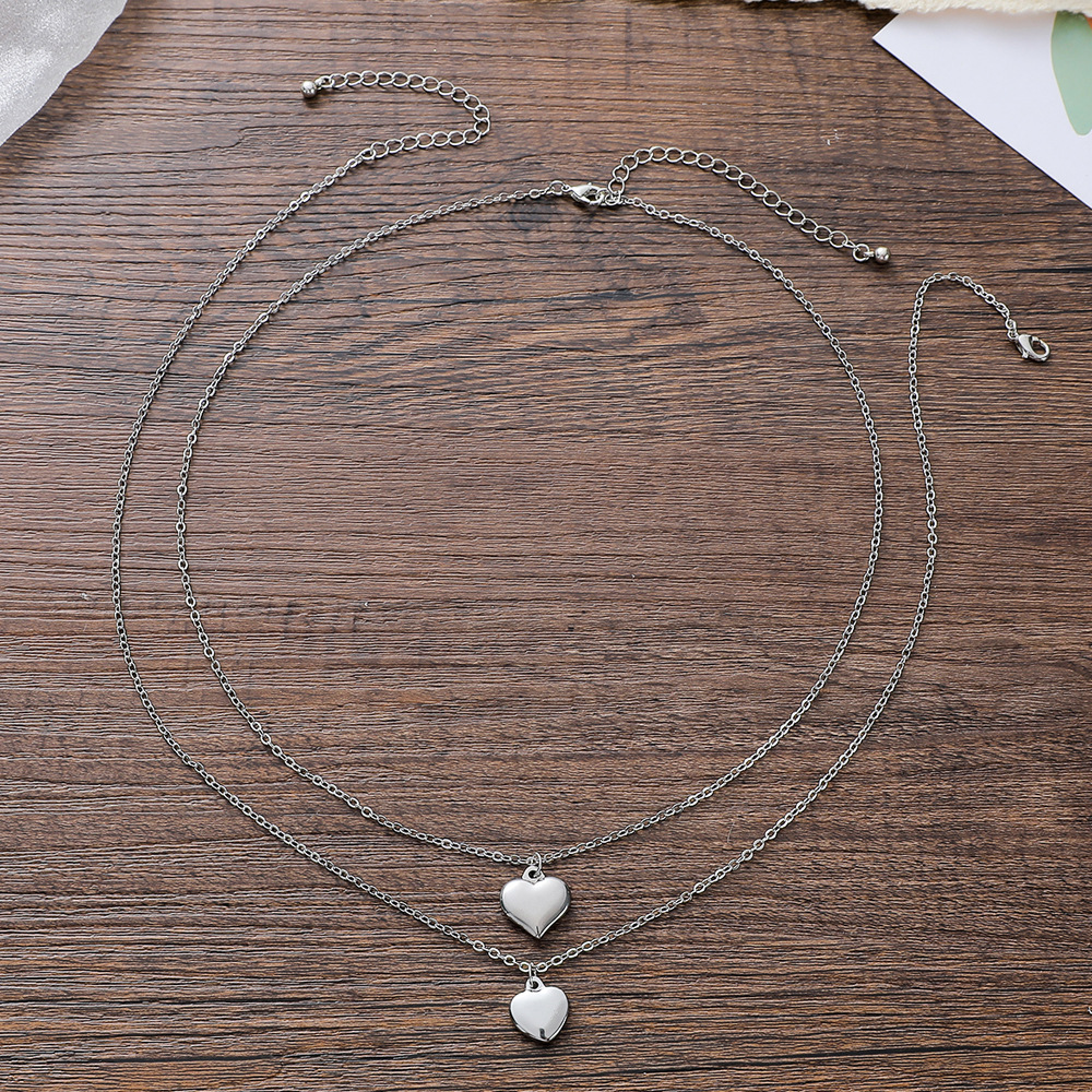 New Peach Heart Stainless Steel Parent-child Clavicle Chain Non-fading 2-piece Set Wholesale display picture 3