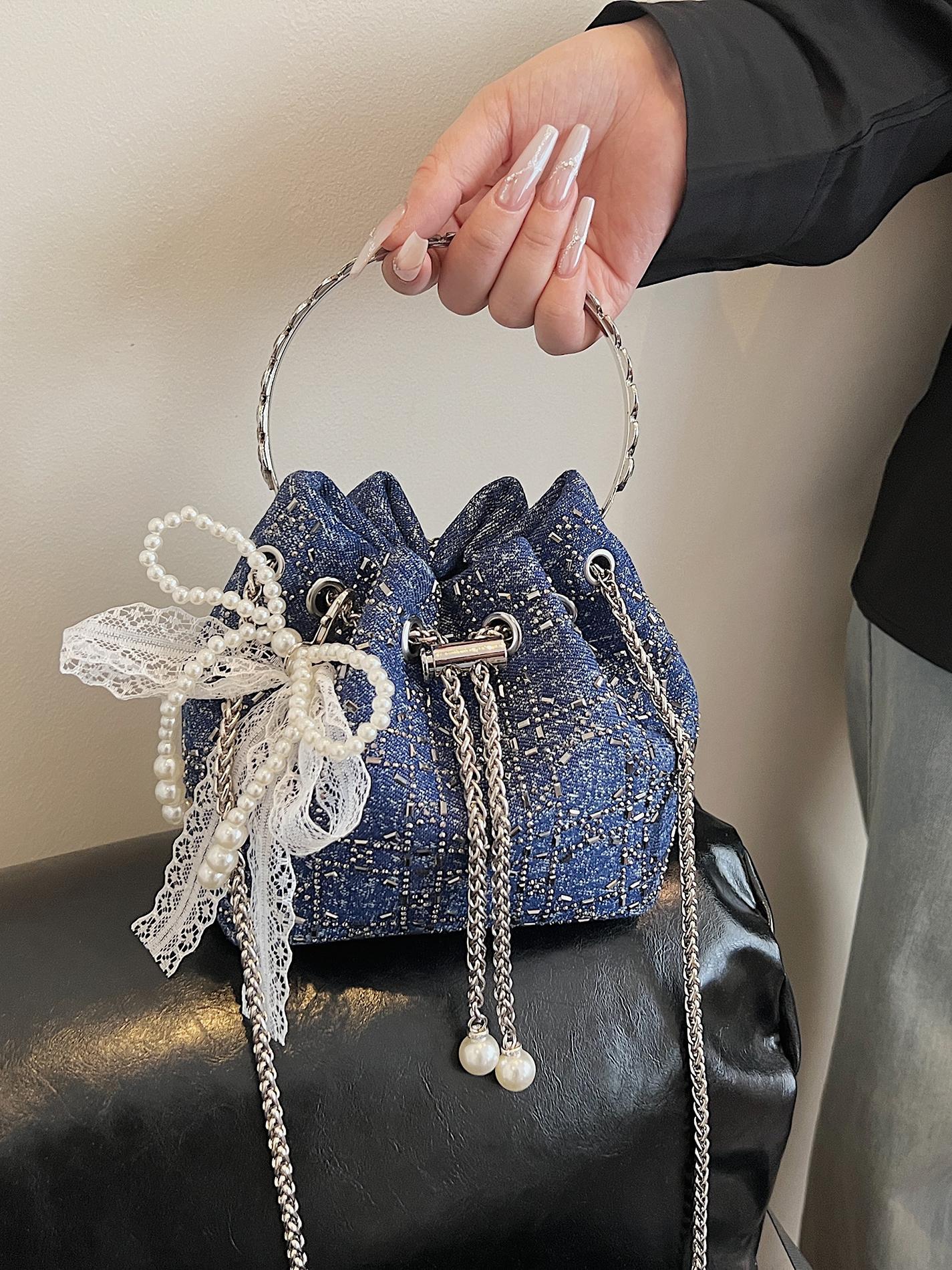 Verano popular taladro caliente bolso de cubo de mano mujer 2025 nuevo estilo coreano denim casual mochila para trabajar