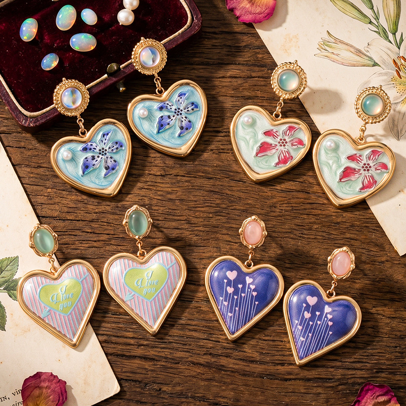 TENA estilo francés estilo medieval esmalte pintado estilo amor pendientes de mujer retro goteo de aceite ligero lujo alta sensación de pendientes