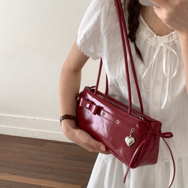 Texturas transfronterizas lujosas pequeñas bolsas de mano para mujeres verano 2026 nueva moda de moda de brazalete de hombro de moda