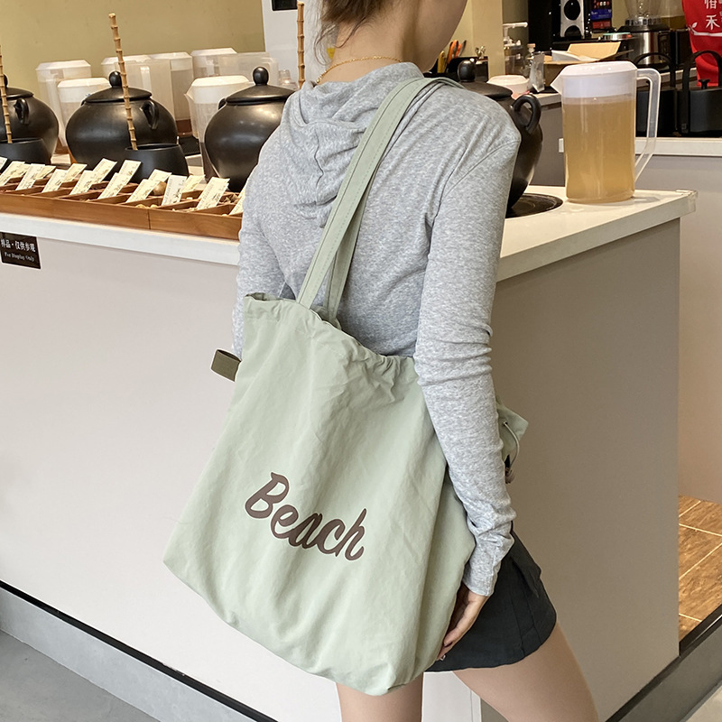 high quality Version Korean-style Letter Printed Bag Women's Large Capacity Nylon Shoulder Bag Casual All-match Portable Drawstring