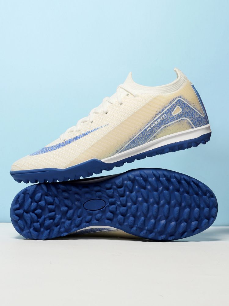 Nuevos zapatos de entrenamiento de césped interiores de hombres y mujeres transfronterizos respirables de clavos largos juveniles ventas directas