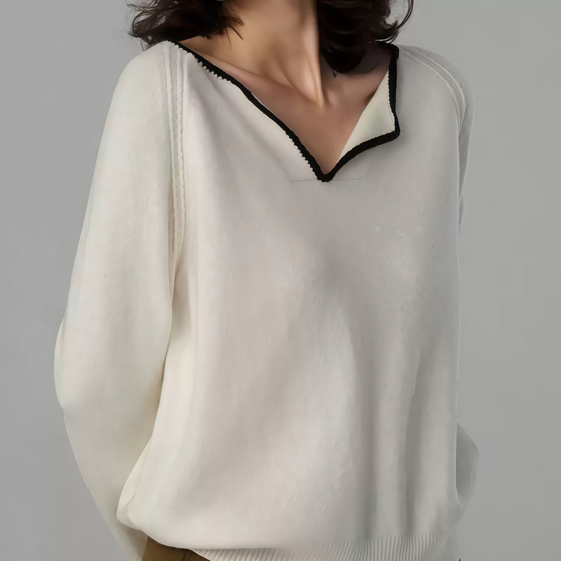 Stylish and unique V-neck sweater for women, perfect for autumn and winter. Loose-fitting, casual, and chic in a creamy white color. A trendy wool blend knit top Stylish and unique V-neck sweater for women, perfect for autumn and winter. Loose-fitting, casual, and chic in a creamy white color. A trendy wool blend knit top