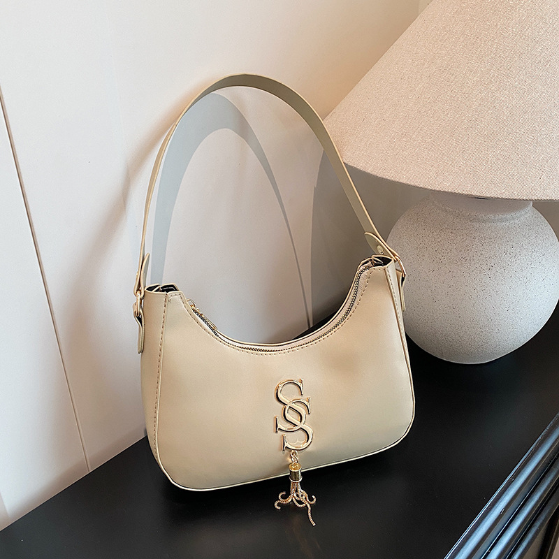 Bolso de hombro retro coreano primavera / verano 2024 nueva moda bolso de hombro de moda bolso de media luna de mujer