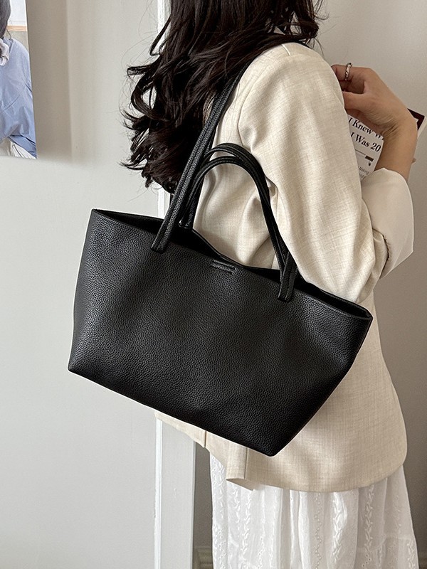 Bolso para mujeres 2026 nueva moda simple mochila de hombro casual textura alta lujosa bolsa de trabajo diaria