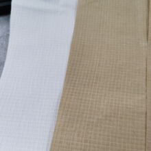 带线牛皮纸夹线纸常用于包装大型重型物品如机械零件、建筑材料等