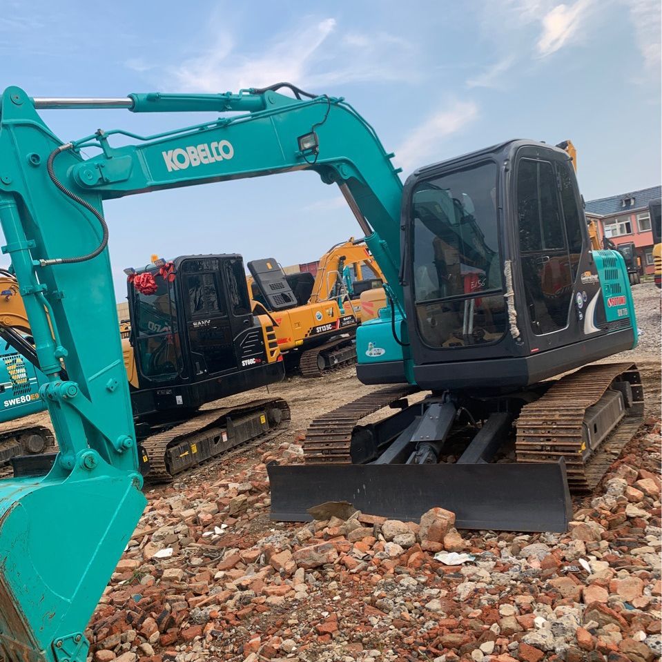 Exportación de comercio exterior de segunda mano Shengang 75 y 80 excavadoras con martillo de trituración original