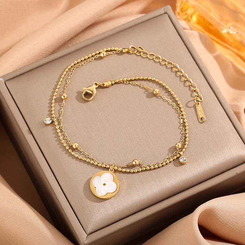 Corea del Sur Nueva Shell Flor de cuatro hojas de ZIRCON tobillos de doble capa de cuentas redondas electroplated 18K oro rosa de oro pie de la joyería