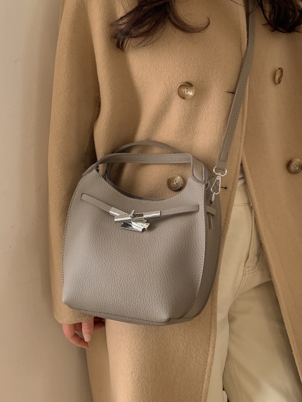 Bolso de mujer nuevo estilo coreano nicho de moda lichi bolso de cubo portátil de alta sensación de ocio mochila de viaje