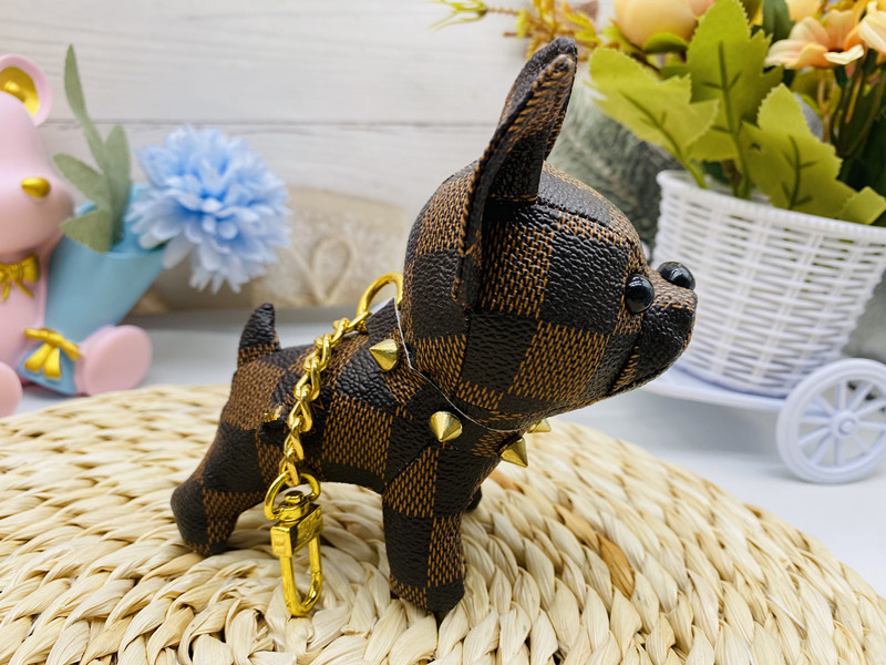Bolsos de burro al por mayor cachorro red de cuero viejas flores dibujos animados pequeños par adornos de llaves de automóviles lindos