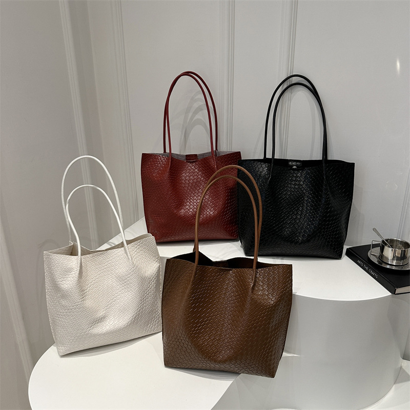 Relajación retro 2025 nueva moda tejida bolso Tote bolso casual para niños y madres bolso literario de un solo hombro para axila