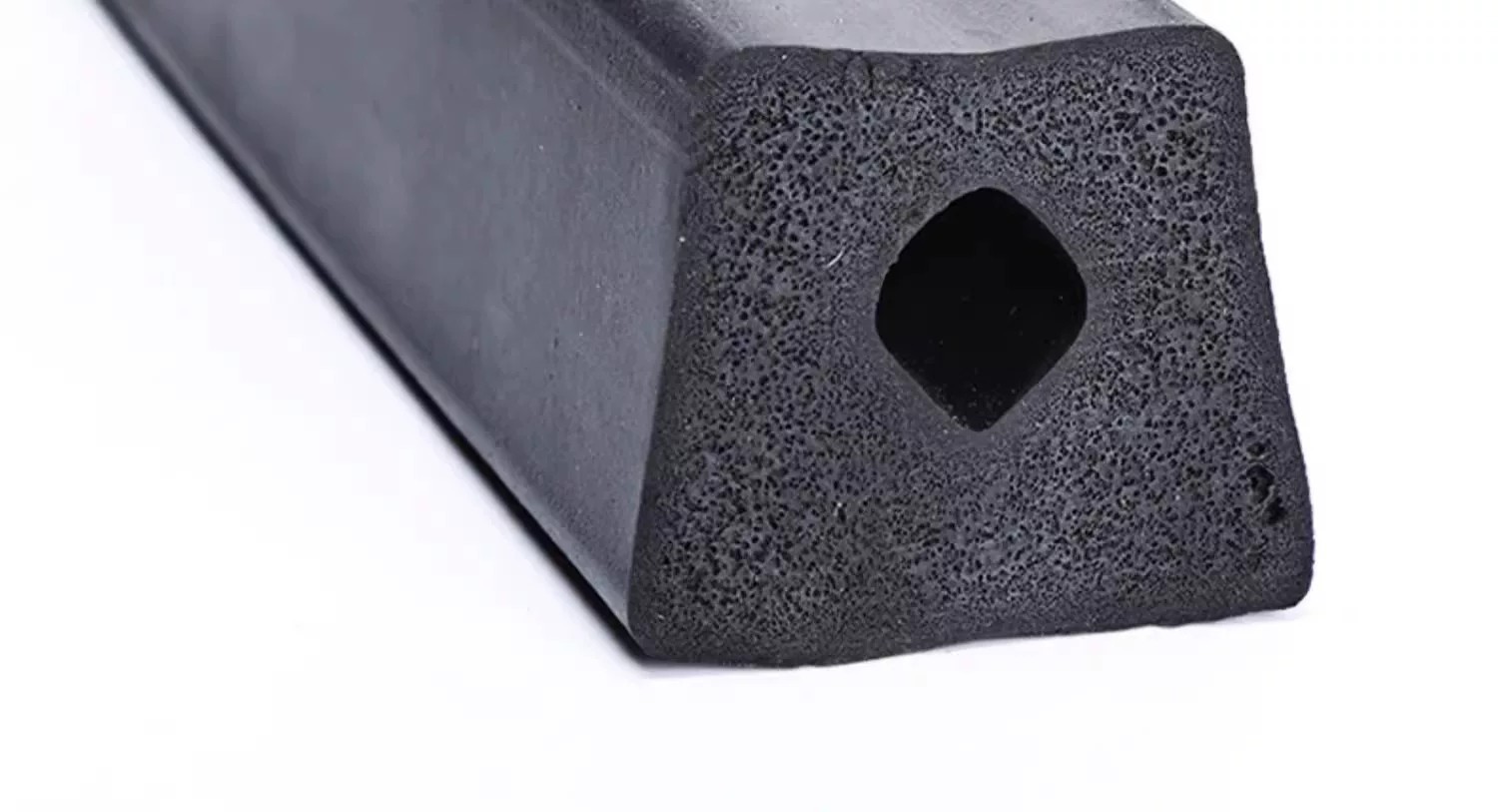 Durable rubber seal strip for the rear door of dump trucks and construction vehicles, designed to prevent leaks and dust, used for tailgate modification