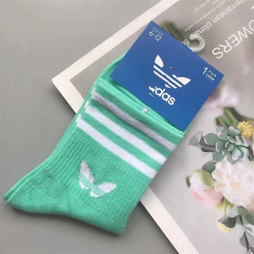 2024 primavera y otoño AGREGAR calcetines de baloncesto deportivos de media pantorrilla de tres hojas de hierba alta marca de moda corriendo calcetines de fútbol