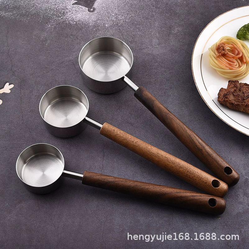 Пластиковая? Wait the input: "Coffee measuring spoon stainless steel, long multifunctional measuring cup for home use"