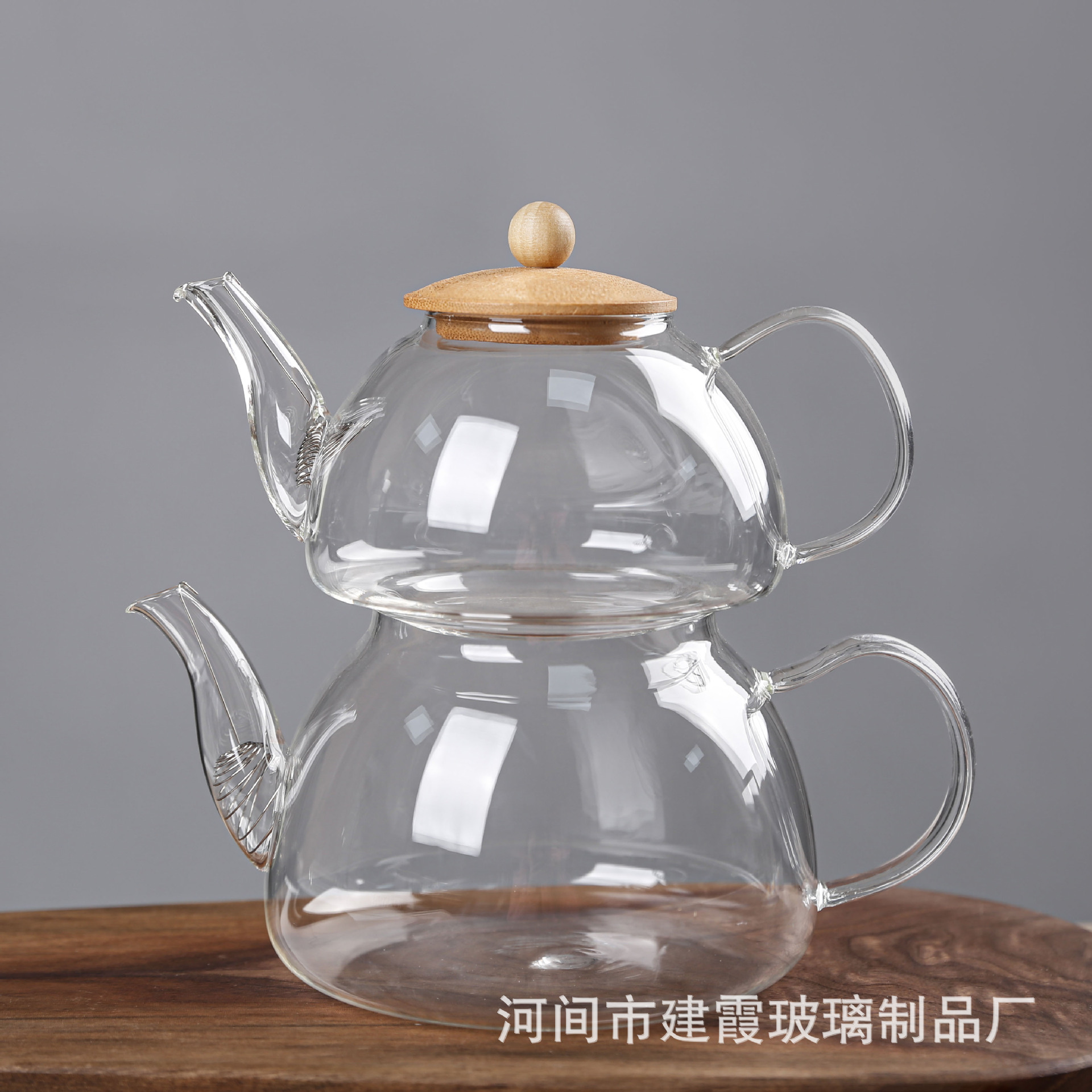 Tetera de borosilicato alto con infusor, tetera de vidrio resistente al calor, separación de té y agua, venta al por mayor para el hogar, diseño simple.