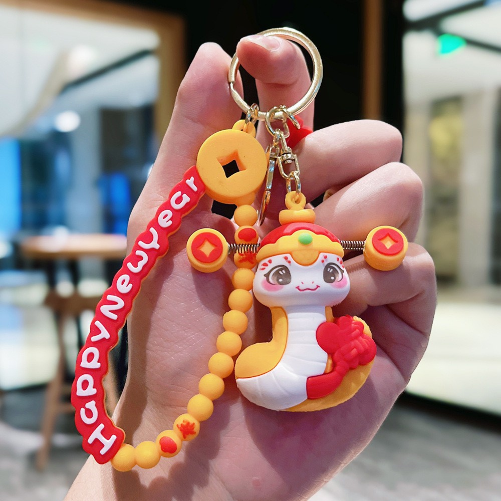 Muñeca de dibujos animados goteo llavero bolsas escolares exquisitas para hombres y mujeres colgantes para agarrar muñecas colgantes para el mercado nocturno regalos al por mayor