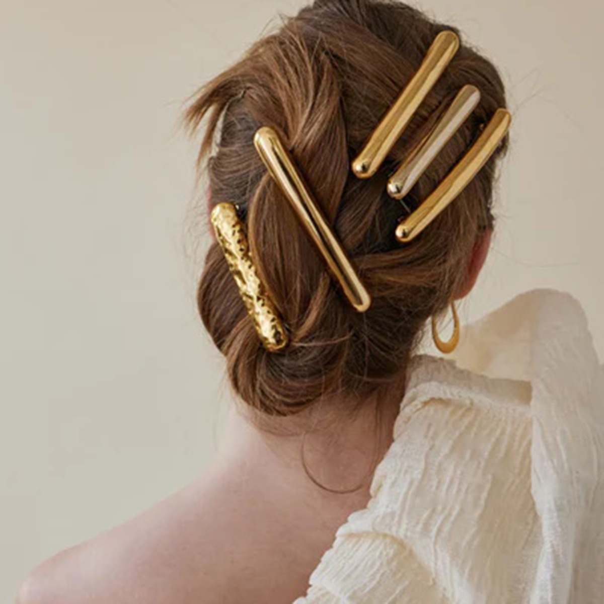 Europa y los Estados Unidos viento metal de acero inoxidable clip de cabello para la cabeza de la mujer de alta calidad sensación de disco de cabello duradero un clip de cabello conjunto de cuerda de cabello