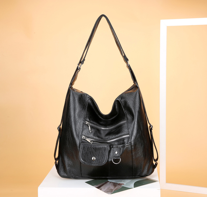 Transfronterizo nuevo bolso de las mujeres de la PU de la moda europea y americana mochila retro de las mujeres simple casual multi-funcional de las mujeres