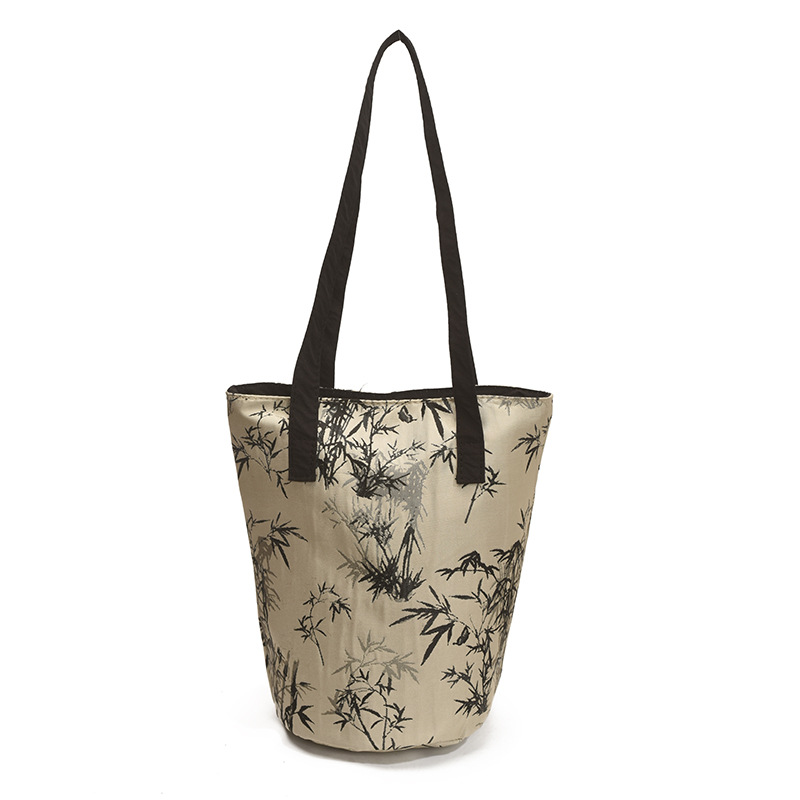 Nuevo bolso de cubo chino 2025 nuevo bolso femenino de seda bolso de bambú de estilo nacional bolso de hombro de caqui de alta calidad marea