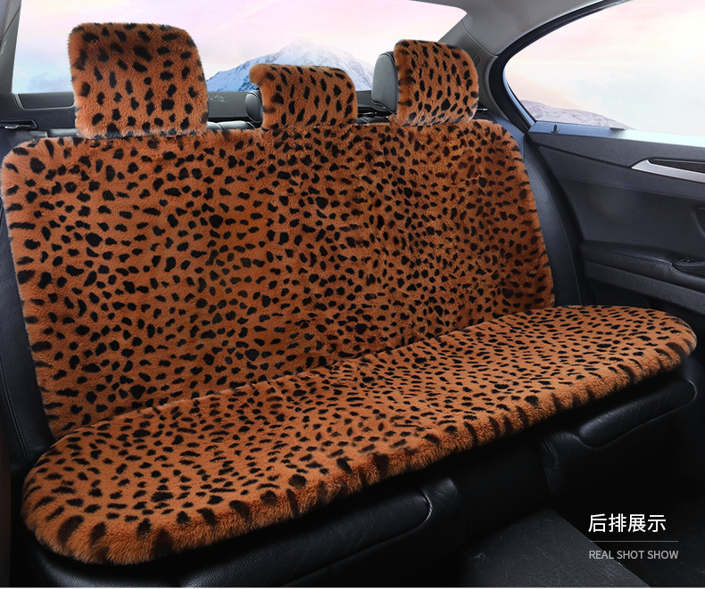 新しい冬のぬいぐるみの車のクッションネットの赤いヒョウの紋様のぬいぐるみの5つの共通のシートの快適な保温のクッション|undefined