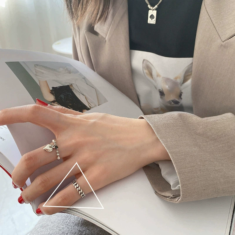 retro fashionable geometric ring hip-hop style, silver 925 sample, on index finger