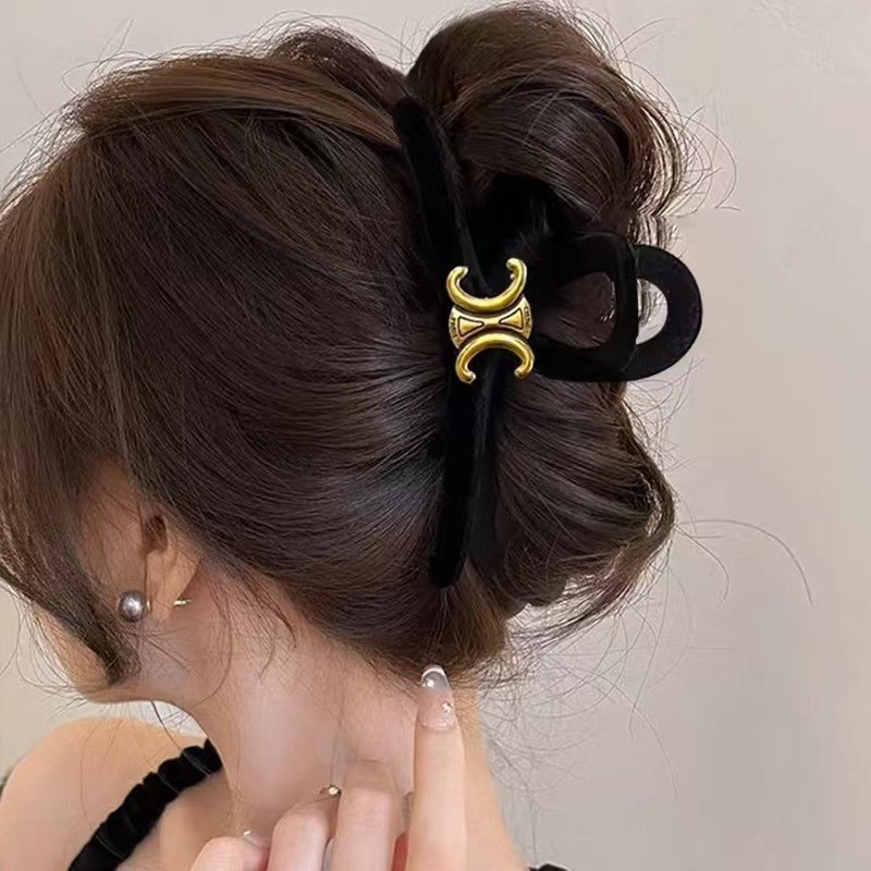 Flocked black arc de triomphe 13cm