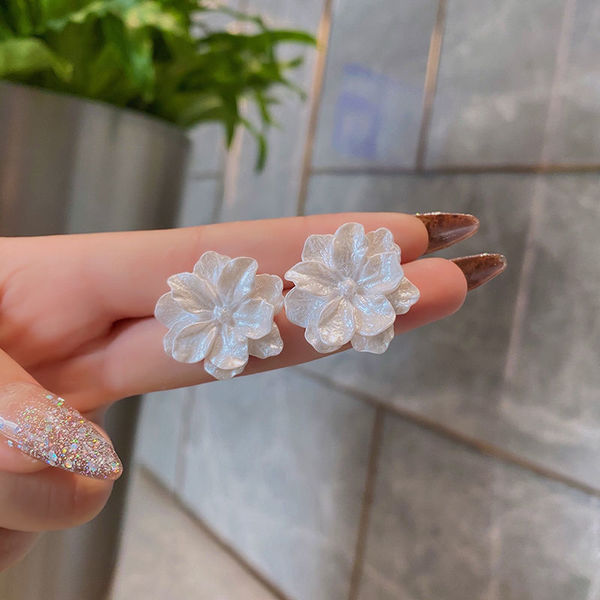 White small design earrings