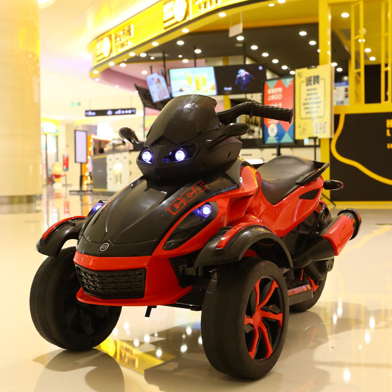 Niños motocicleta eléctrica todoterreno coche de playa carga doble tracción amortiguador coche de juguete de tres ruedas para montar coche eléctrico