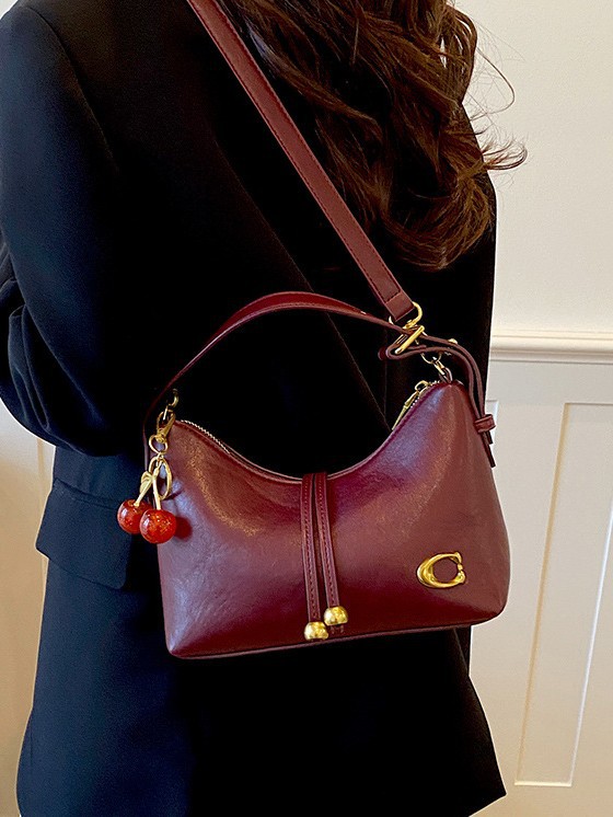Bolso de mujer de moda de verano bolso de mano popular nicho coreano lujo ligero universal de alta calidad de viaje de hombro mochila