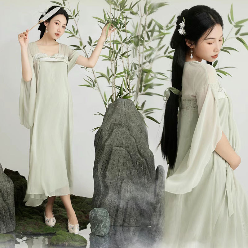 撮影のテーマの妊婦の新しい中国式の写真撮影の服装の妊娠するマミーの大きい腹は水墨画の風格を照らして長いスカートを撮影します。